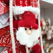 Pendente con 3 Babbo Natale in tessuto 55x19 cm